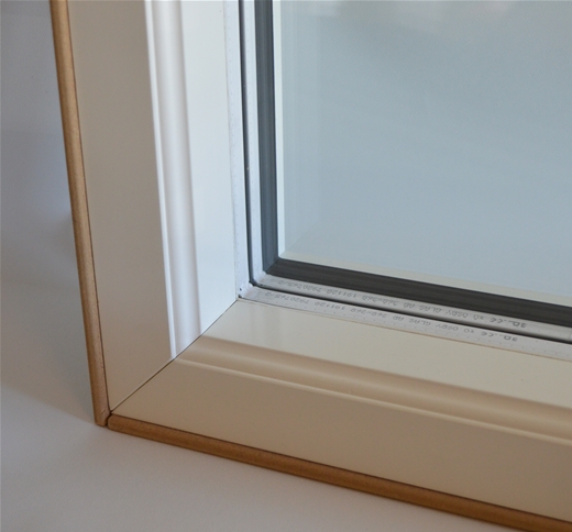 Detaljbild fast fönster trä/aluminium inifrån
